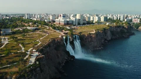 Top aerial view on a waterfall falling from a cliff Stock Footage 196741044