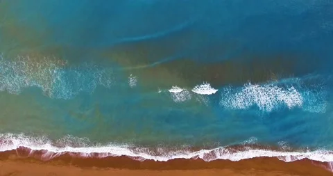 Top Aerial View of Wave Forms on Sandy Beach Stock Footage 149883030