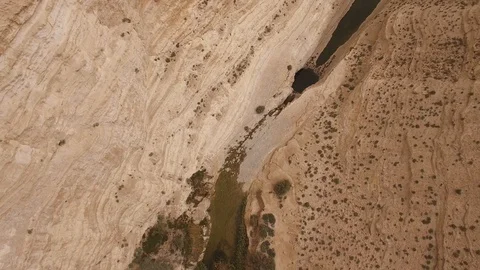 Top aerial of waterfall at Ein Avdat canyon. Negev Desert. Israel. DJI-0207-10 Stock Footage 123652288