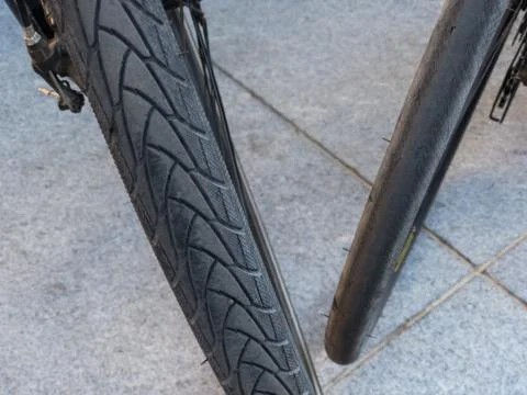 Top and close view of two bicycle  wheels with different types of tires Stock Photos