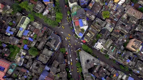 A top angle aerial drone shot of the crossroads with moving vehicles Stock Footage 315025518