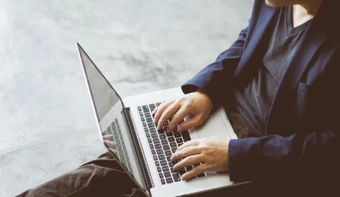 Top angle and closeup view  of businessman using the laptop . Stock Photos