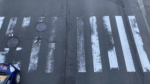 Top angle of a busy crosswalk intersection Stock Footage 137071008