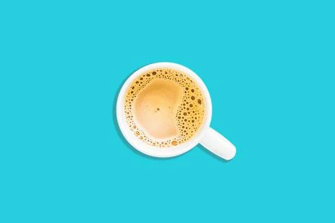 Top angle of a cup of milk tea "Teh tarik" on blue background Stock Photos