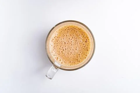 Top angle of milk tea or popularly known as The Tarik in Malaysia, isolated o Stock Photos