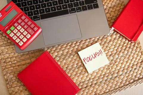 Top angle. Office concept. With hand writing focus word using red marker on y Stock Photos