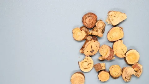 Top angle pan view herb GanCao or Glycyrrhizae Radix et Rhizoma or Liquorice Stock Footage 145724485