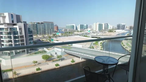 Top angle pov first person window view over a balcony at waterfront of Al R.. Stock Footage 287419436