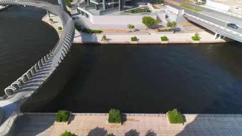 Top angle pov first person view from a balcony at canal of Al Raha beach in.. Stock Footage 287419446