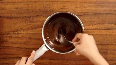 Top angle Shot of Chocolate mixing with vanilla essence Видео 82636061
