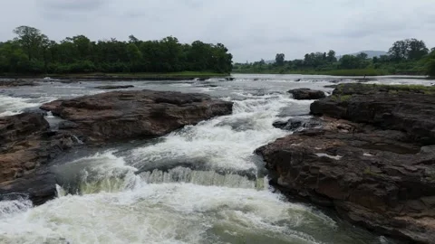 Top angle shot of Dam water flowing through the rock. Stock Footage 285386229
