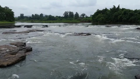 Top angle shot of Dam water flowing through the rock. Video stock 285386347