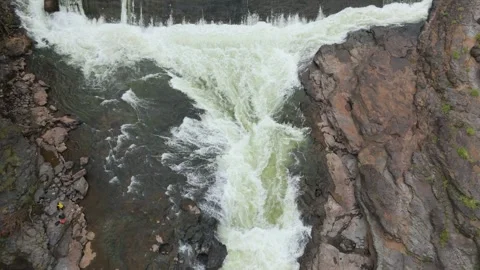 Top angle shot of Dam water flowing through the rock. Stock Footage 285476907
