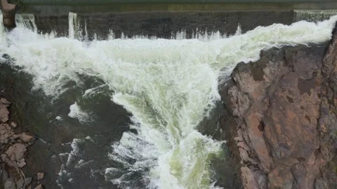 Top angle shot of Dam water flowing through the rock. Stock Footage 285476975