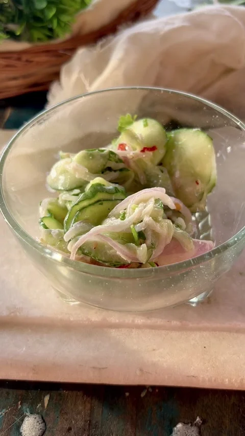 Top Angle shot of Delicious cucumber salad in a glass bowl. Stock Footage 286216631