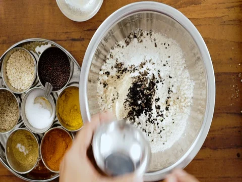 Top Angle shot - Flour and Indian Spices get mixed with hand 動画素材 80419798