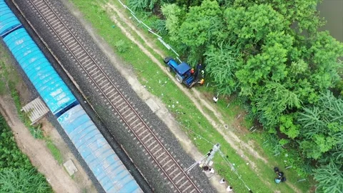 Top angle shot of Indian railways goods train going unload Stock Footage 313586397