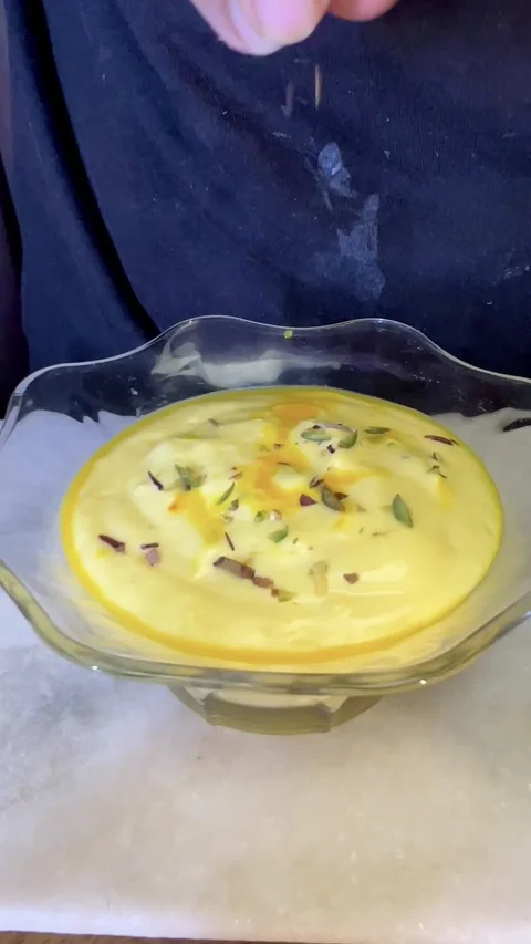 Top angle shot of mango cream in glass bowl.  Ice cream texture. Stock Footage 287437030