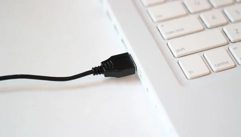 Top angle - Unplugging/plugging in USB computer jack socket Stock Footage 4502349