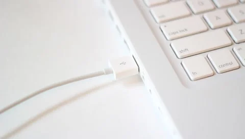 Top angle - Unplugging/plugging in USB computer jack socket (white cable) Stock Footage 4502665