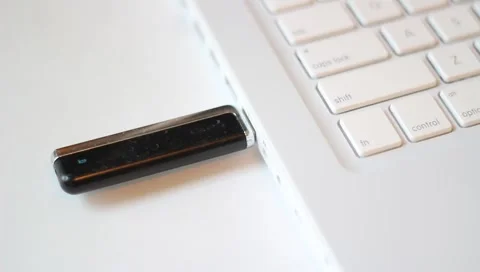 Top angle - Unplugging/plugging in USB stick drive computer jack socket Stock Footage 4502070