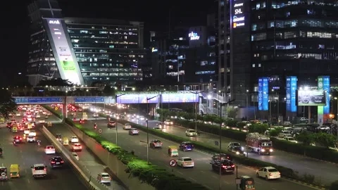 Top angle view of a busy evening road traffic in Cyber City, Gurugram, India Video stock 295369484