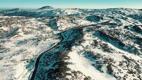 Top angle view drone video of a vehicle coming on snowy road 스톡 동영상 236964667