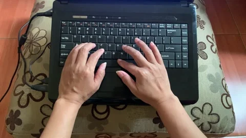 Top Angle View Hands Typing on Laptop Keyboard 4K Real Time Stock Footage 344965548