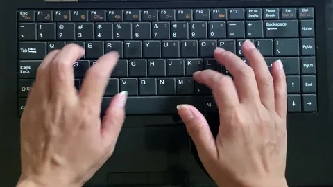 Top Angle View Hands Typing on Laptop Keyboard 4K Real Time Stock Footage 344965550