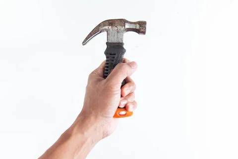 Top angle of young man left handed using hammer on white background Stock Photos