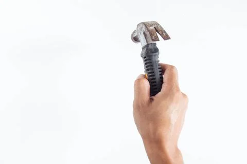 Top angle of young man right handed using hammer on white background Stock Photos