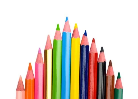 Top arrow shape made with some different colored wood pencil crayons on a whi Stock Photos
