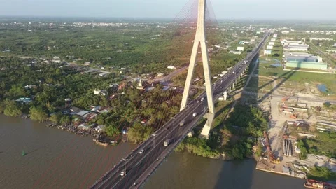 Top ascending aerial view of cable- stayed Can Tho bridge road with driving cars Stock Footage 168417477