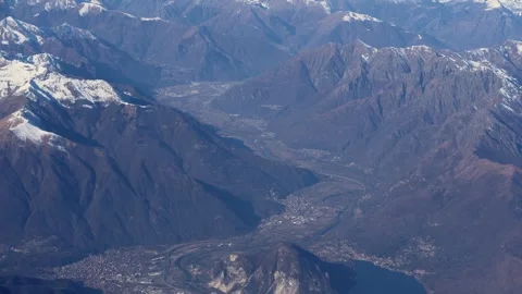 Top bird eye View from passenger porthole of beautiful landscape Flying airplane Stock Footage 295156329