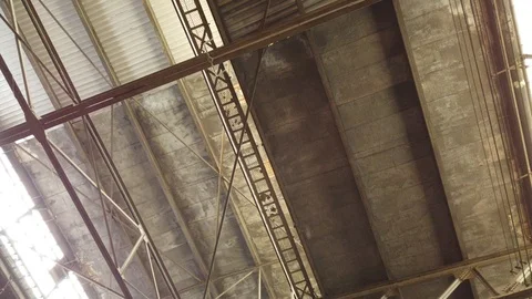 Top To Bottom Panoramic Shot Of Warehouse With Beams Lights And Windows Stock Footage 121198791