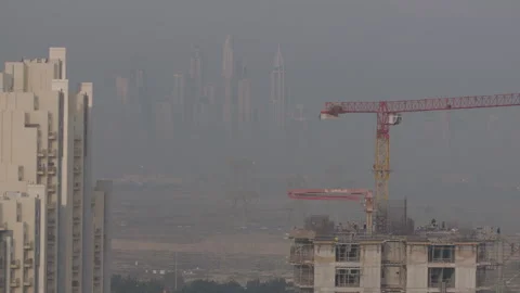 Top of a building under construction in Dubai, skyscrapers in background 動画素材 289652860