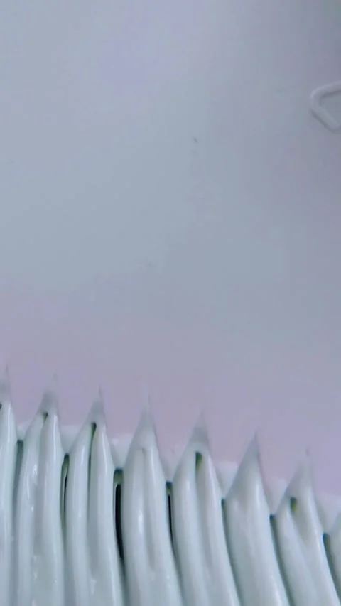 Top close up of creating a wavy texture on beauty cream. Smooth pattern man.. Stock Footage 340012687
