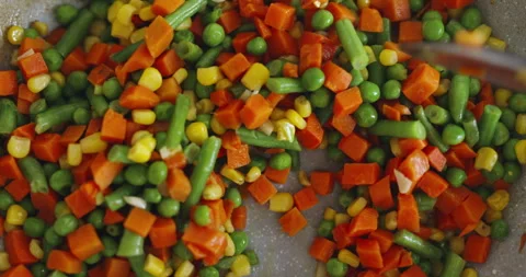 Top close view of Mexican or Hawaiian mixture of chopped vegetables that are 스톡 동영상 245567839