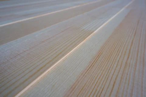 Top close up view of stack of three-layer wooden glued laminated timber beams 스톡 사진