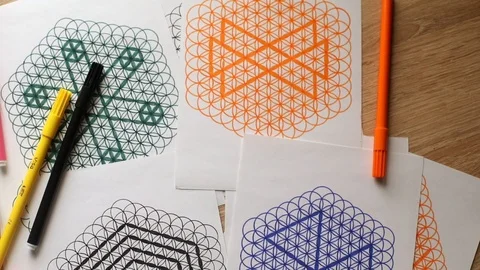 Top closeup view of sacred geometry pictures with colorful pens in creative 스톡 동영상 91650554