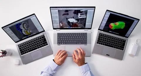 Top Digital Designer Developing Battery Pack Simulation On Personal Laptop. Stock Photos