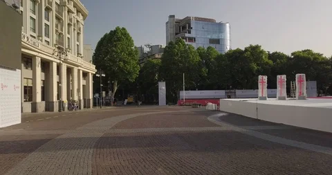Top Dolly slider view of an empty street early morning and driving car Stock Footage 108600621