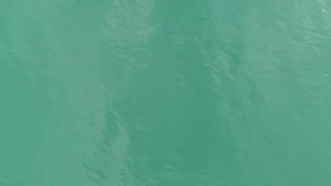 Top down 4K drone footage: turquoise Black Sea water surface, Batumi coastline, 스톡 동영상 337404667