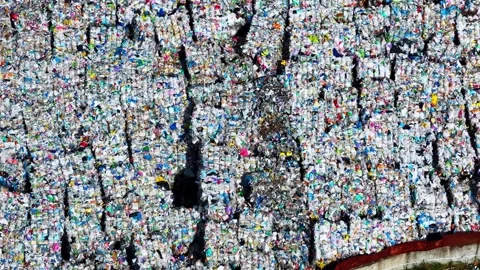 Top Down Abstract Texture of Densely Packed Plastic Recycling Bales Stock Footage 337388059