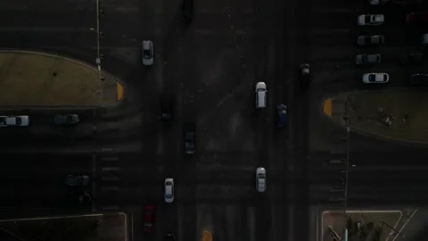 Top down aerial above 4 way intersection during day in desert town suburbs Stock Footage 254131302