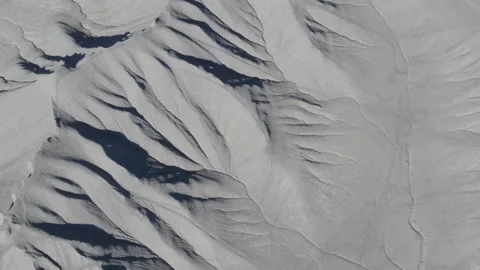 Top down aerial above gray bentonite desert textures in Caineville, Utah Stock Footage 173239602
