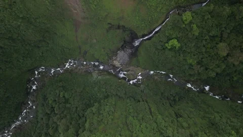 Top down aerial above Quebrada Gata waterfall on Rio Toro in Costa Rica Stock Footage 330216789