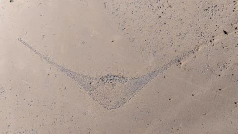 Top Down Aerial Ancient Stone Geoglyph Triangular Desert Floor Morocco Stock Photos