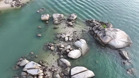 Top Down Aerial Ascending Over Rocky Shore Stock Footage 323612014