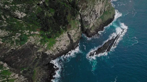 Top down aerial of the Atlantic ocean coast and the mountains of Madeira Video stock 303054841